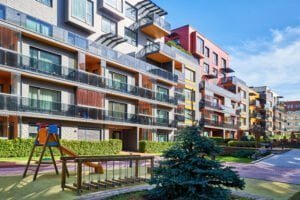 Children playground at Modern complex of apartment residential buildings. With outdoor facilities.